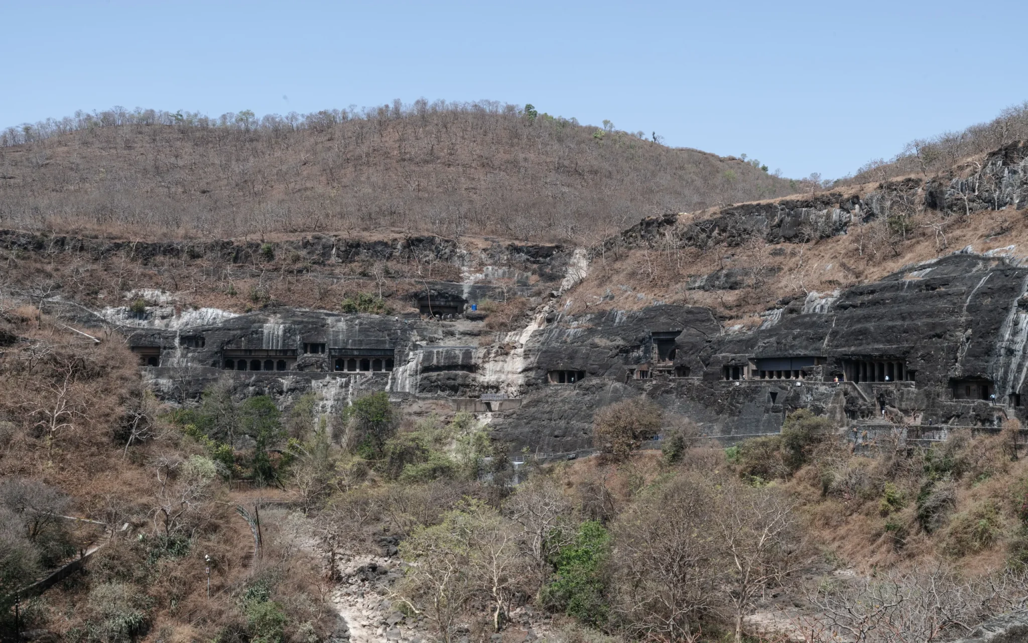 The Ajanta caves carved into the gorge hillside