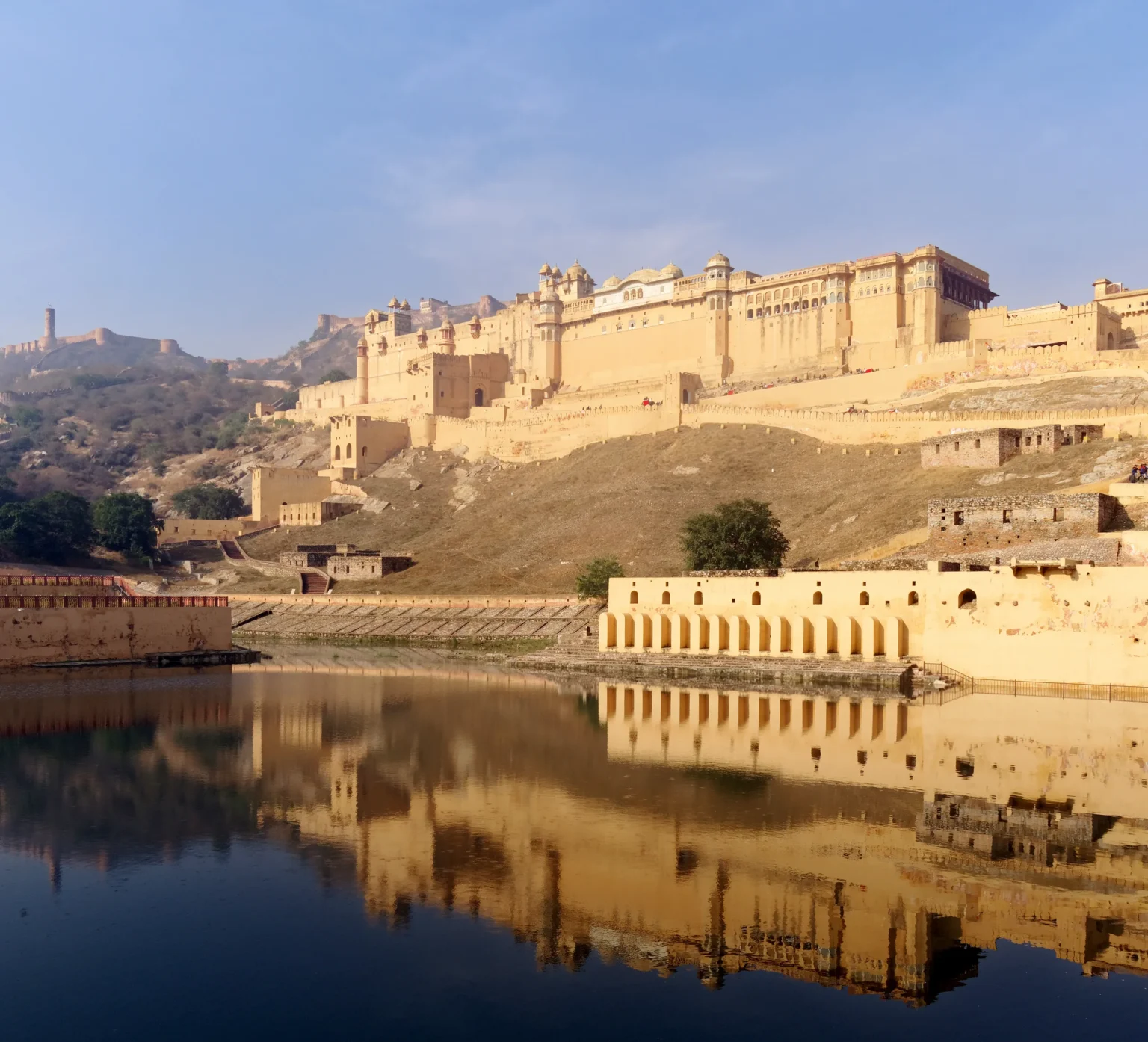 Amber Fort reflected in Maota Lake, Jaigarh Fort on the hills