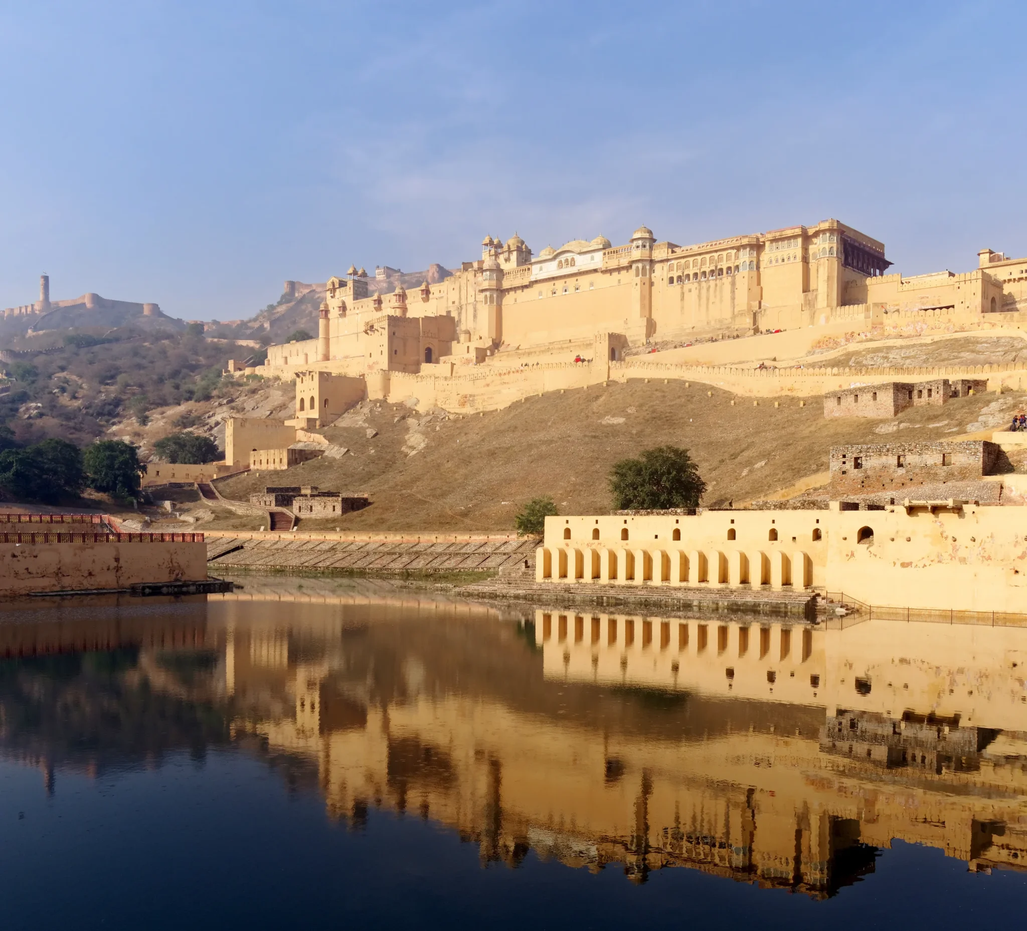 Amber Fort reflected in Maota Lake, Jaigarh Fort on the hills