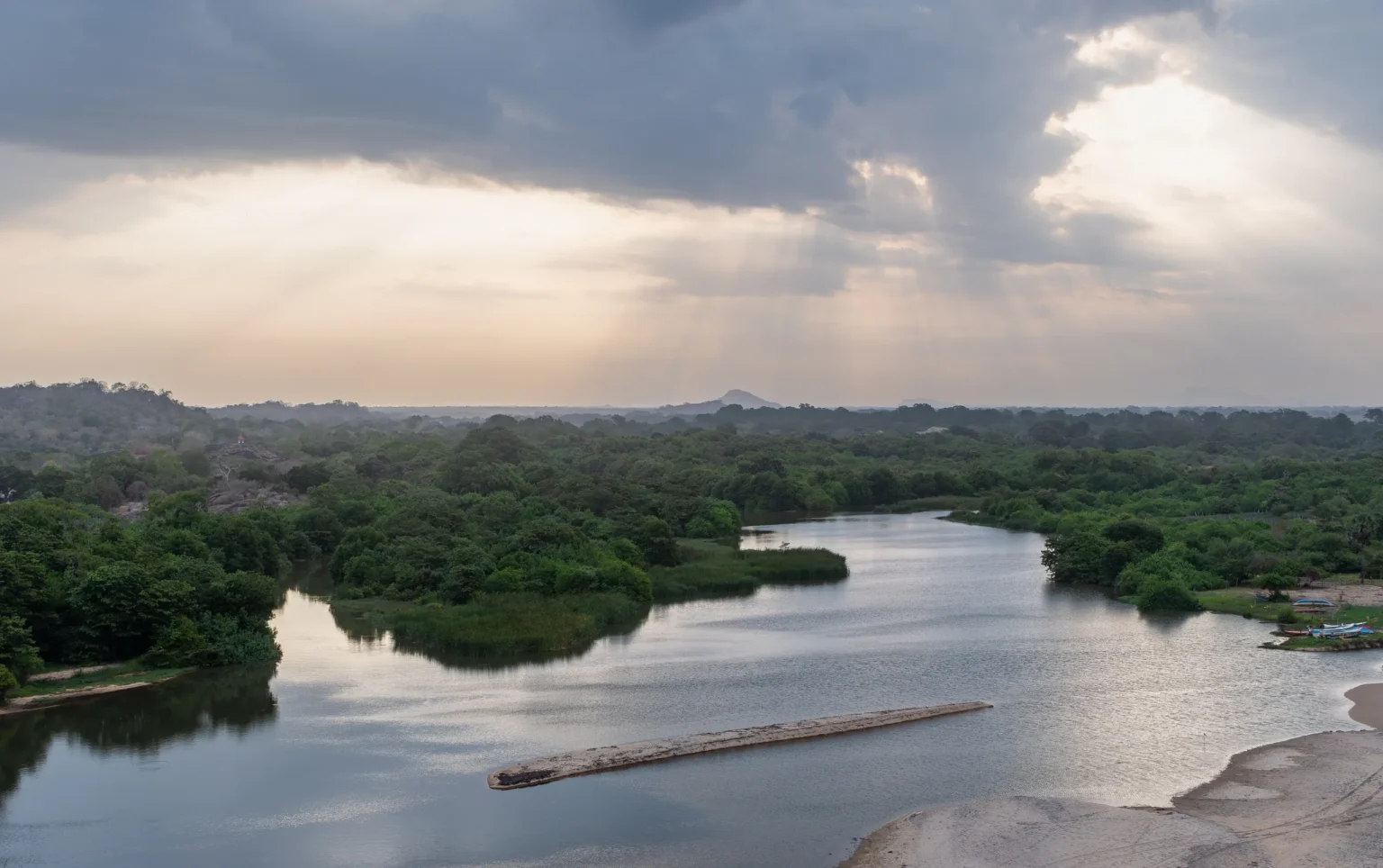 Heda Oya river winding through forest near Arugam Bay at evening