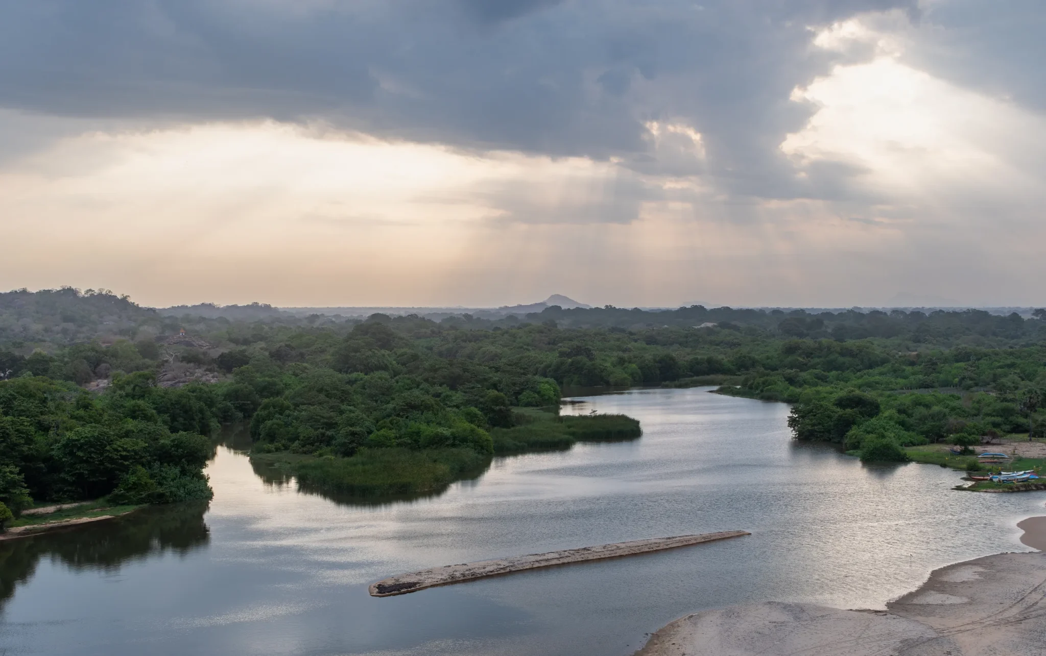 Heda Oya river winding through forest near Arugam Bay at evening