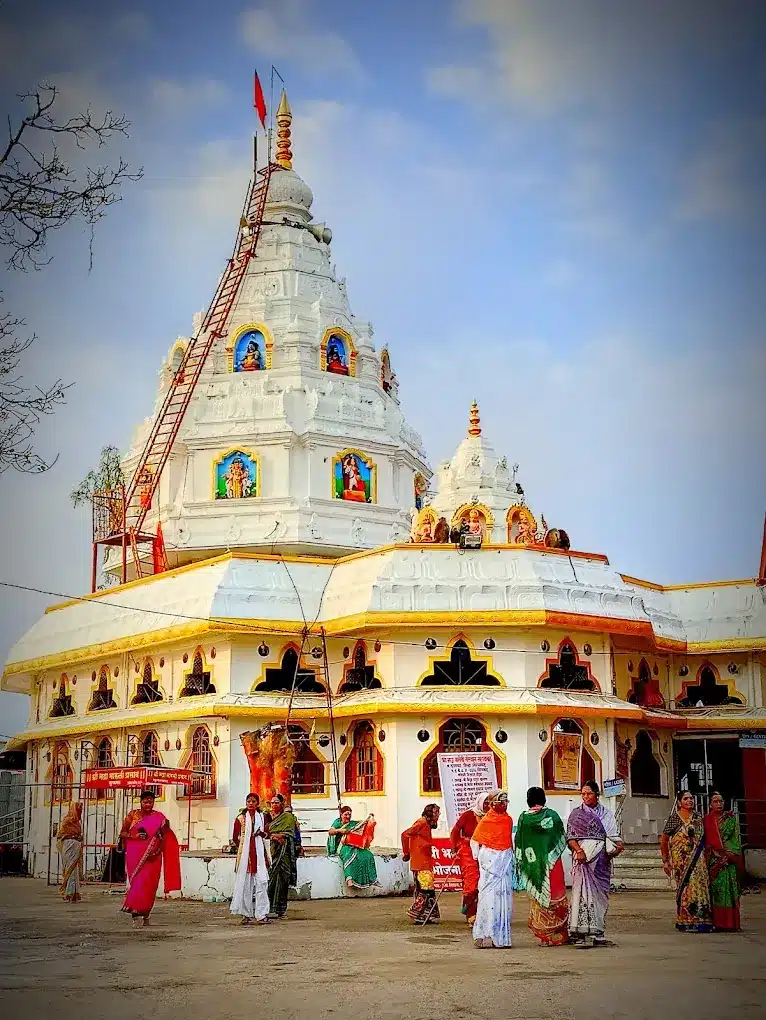 Devotees outside the white and gold Bhadra Maruti Mandir, Khuldabad, near Aurangabad