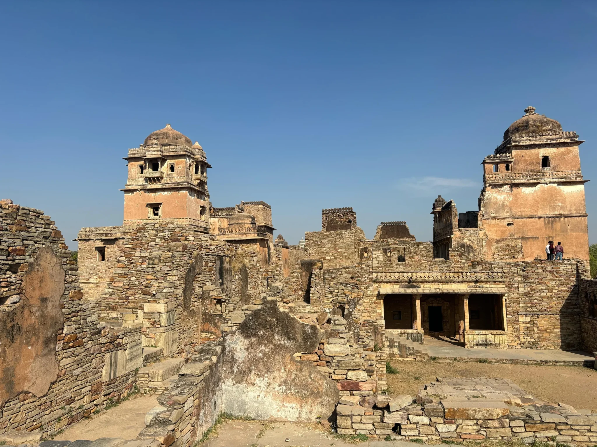 Ruins of Rana Kumbha Palace at Chittorgarh under a clear blue sky