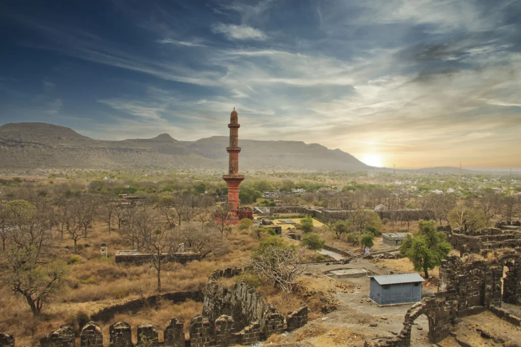 Chand Minar among the ruins of Daulatabad at sunset