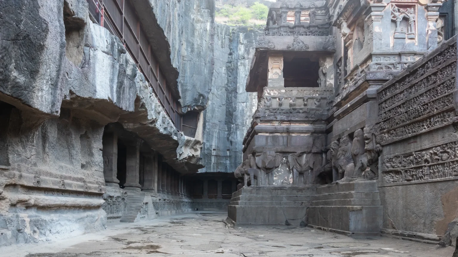 Courtyard and carved reliefs of the Kailasa Temple, Ellora