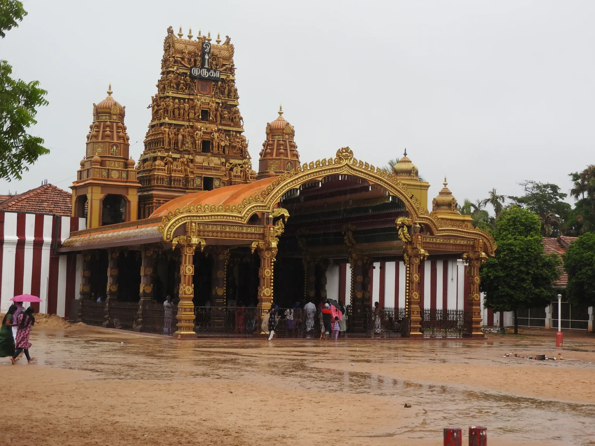 Golden gopurams and arched entrance of Nallur Kandaswamy Kovil, Jaffna