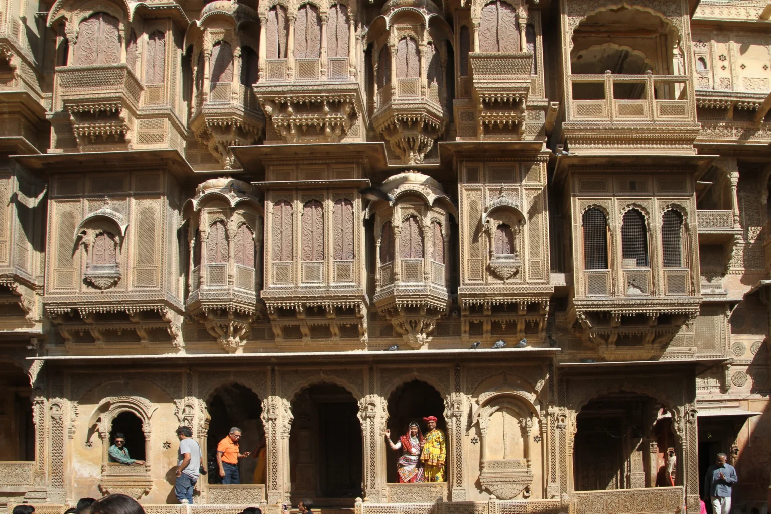 Intricately carved sandstone balconies of Patwon Ki Haveli in Jaisalmer