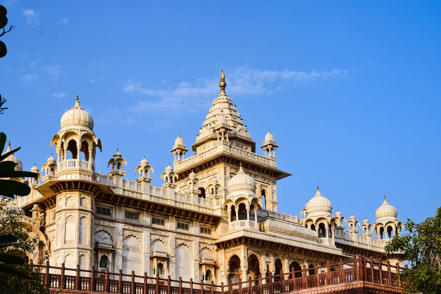 White marble Jaswant Thada cenotaph in Jodhpur under a deep blue sky
