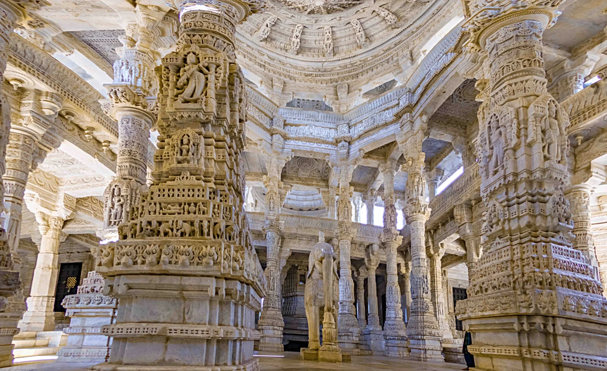 Intricately carved marble pillars inside the Ranakpur Jain Temple