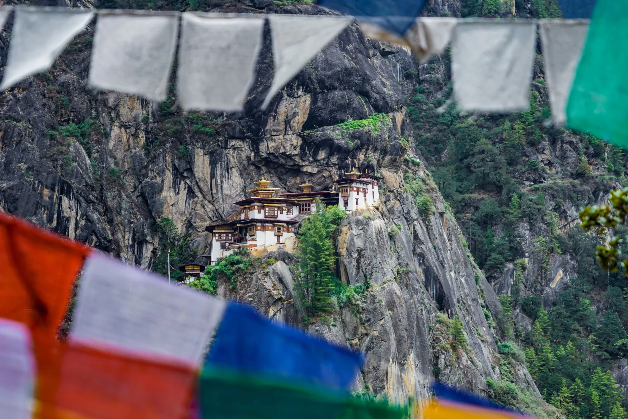 Tiger's Nest framed by prayer flags