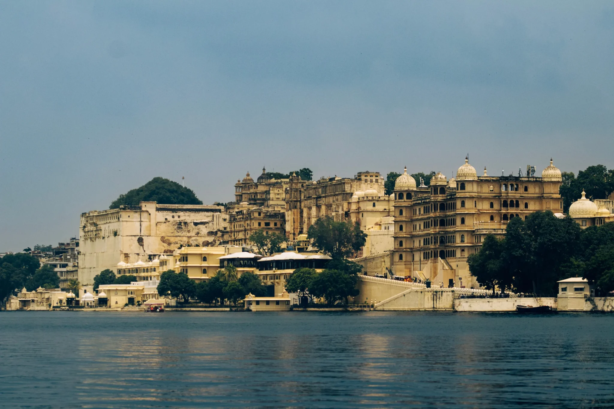 City Palace of Udaipur rising above the waters of Lake Pichola